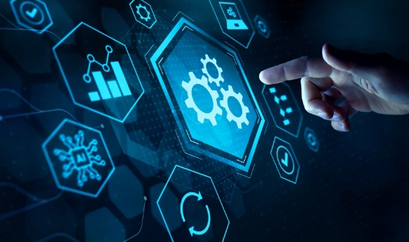 A hand reaches out to touch a transparent digital screen displaying various icons such as gears, a bar graph, a molecule, and a refresh symbol. The background features a dark, honeycomb pattern and an array of hexagonal icons illuminated in blue tones.